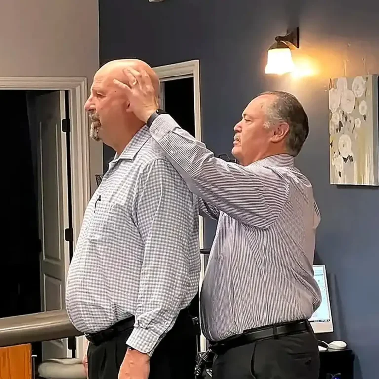 Home 20 chiropractor-performing-standing-cervical-neck-adjustment-on-patient-california-oaks-chiropractic-image